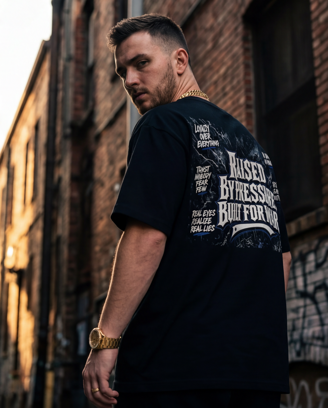 Side profile view of the black 2XL heavyweight t-shirt, highlighting the relaxed sleeve drape and durable construction.
