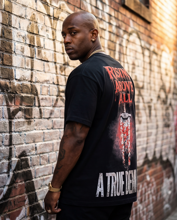 Side profile view of the relaxed, structured boxy fit and durable sleeve stitching on the black XL "No Second Opinion" heavyweight t-shirt.