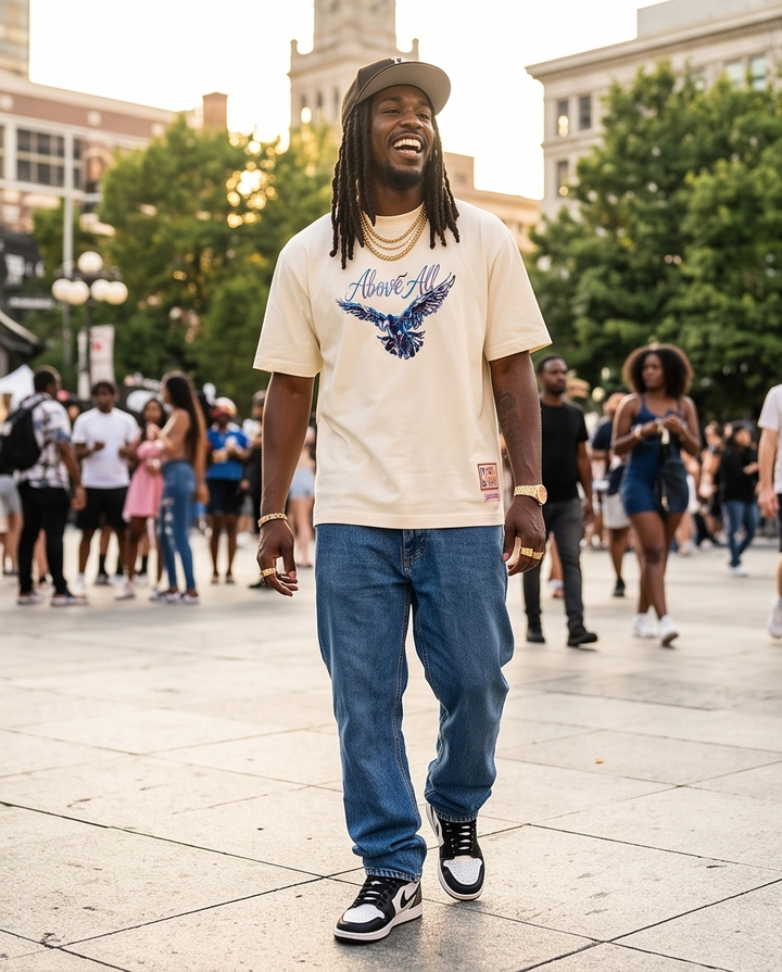 Front view of an Off-White oversized cropped black t-shirt in size Medium, featuring the bold "Above All" streetwear graphic printed across the chest.